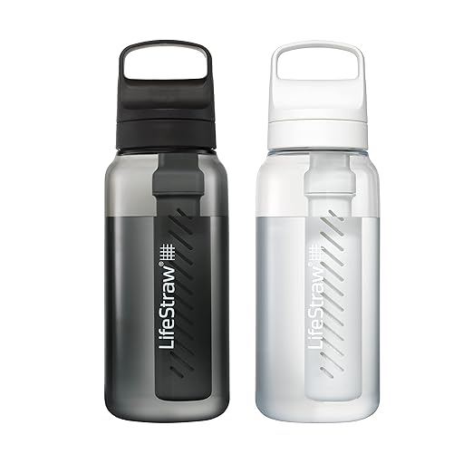 LifeStraw Go Series – BPA-Free Water Filter Bottle for Travel and Everyday use removes Bacteria, parasites and microplastics, Improves Taste, 1L 2-Pack; Nordic Noir and Clear
