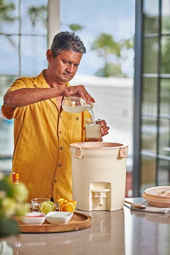 Stanley Adventure Fast Flow Water Jug 2 Gallon | Leakproof Ice Water Dispenser | Insulated Beverage Cooler | Easy Pour Spigot and Latched Foam Lid | BPA-Free
