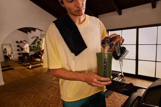 STANLEY Vitalize Shaker Bottle 20 oz | Leakproof Insulated Stainless Steel Shaker Cup | Base Storage and Twist On Fast Flow Lid | Protein Shakes and Pre Workout Powder | BPA-Free | Dried Pine
