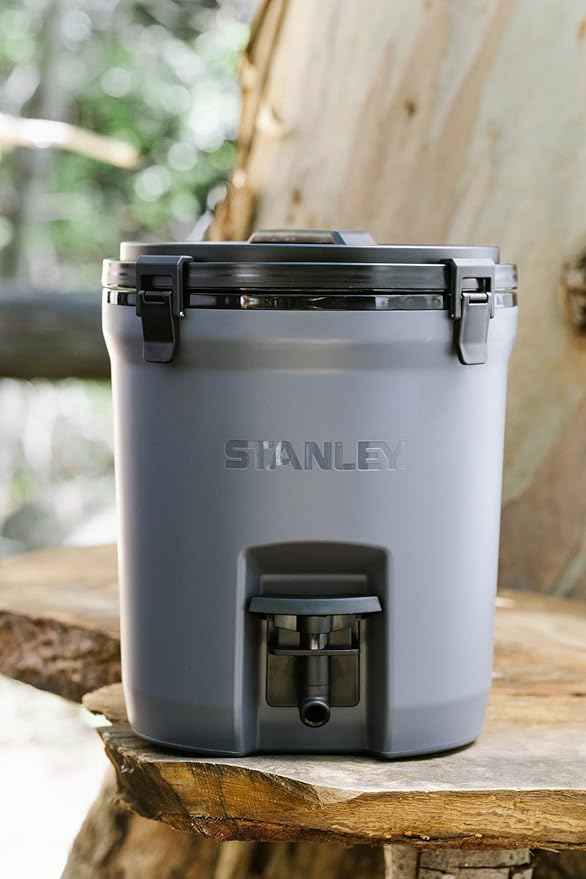 Stanley Adventure Fast Flow Water Jug 2 Gallon | Leakproof Ice Water Dispenser | Insulated Beverage Cooler | Easy Pour Spigot and Latched Foam Lid | BPA-Free