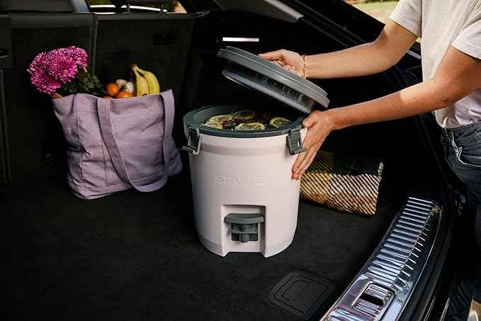 Stanley Adventure Fast Flow Water Jug 2 Gallon | Leakproof Ice Water Dispenser | Insulated Beverage Cooler | Easy Pour Spigot and Latched Foam Lid | BPA-Free