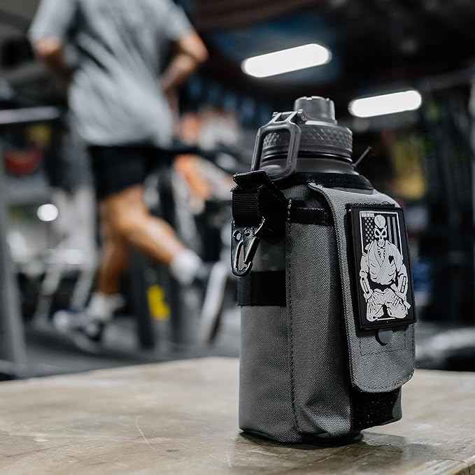 Iron Infidel Battle Bottle - 32 Oz Insulated Water Bottle with Straw Lid & Chug Cap, Stainless Steel Metal Flask Includes Rugged, Removable Sleeve for Keys, Wallet, & Phone (Earned, Not Given 1 Liter)