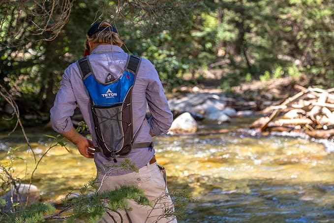 Teton Oasis/Trailrunner Hydration Backpack – Lightweight Water Pack with 2L/3L Bladder for Hiking, Running, Cycling, Biking – 2L/18L/22L Sizes – Sewn-in Rain Cover – Fits Men and Women