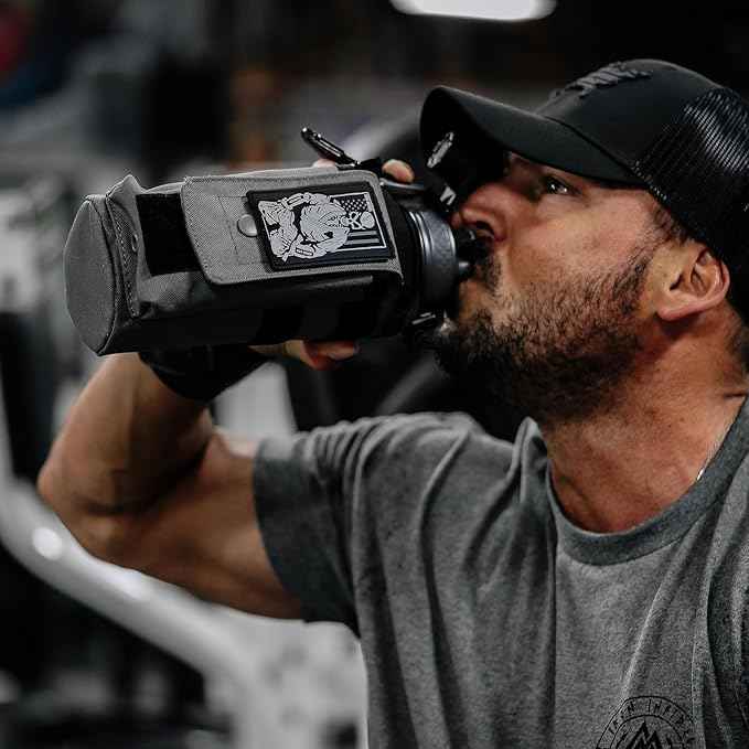Iron Infidel Battle Bottle - 32 Oz Insulated Water Bottle with Straw Lid & Chug Cap, Stainless Steel Metal Flask Includes Rugged, Removable Sleeve for Keys, Wallet, & Phone (Earned, Not Given 1 Liter)