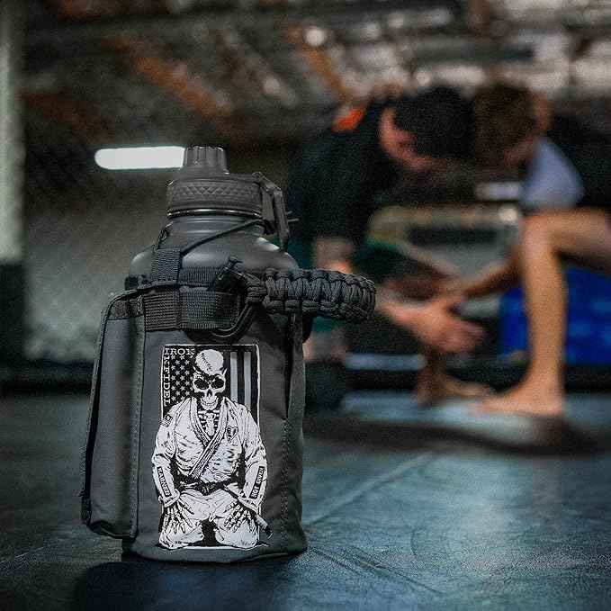 Iron Infidel Battle Bottle - Half Gallon Water Bottle Insulated, 64 oz Stainless Steel Water Jug with Handle - Gym Water Bottle for Men with Rugged Sleeve for Storage (Earned, Not Given 2 Liter)